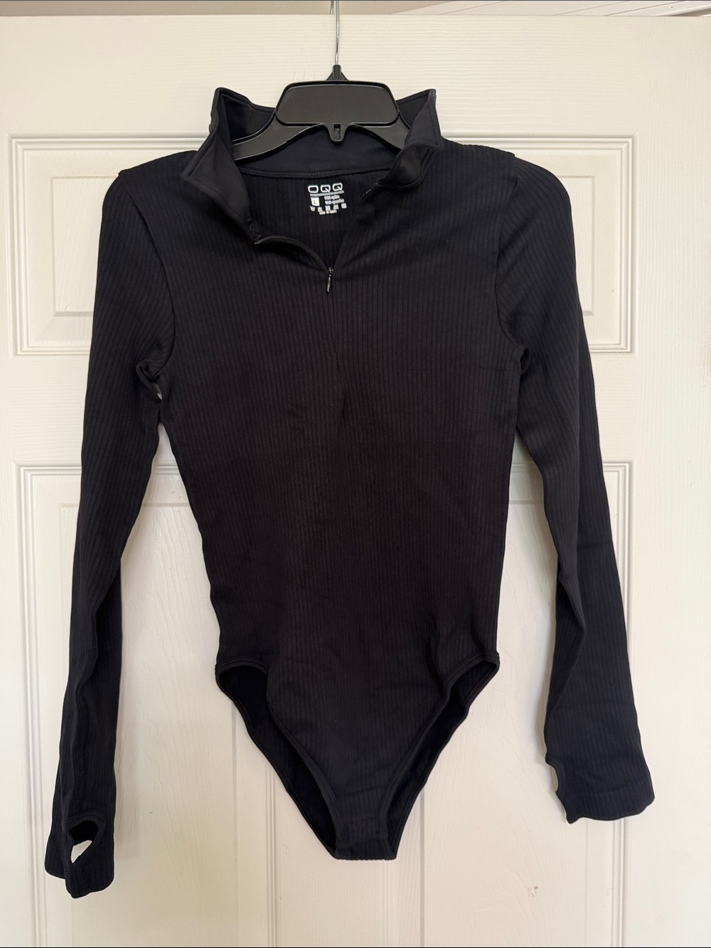 Woman’s OQQ Black Ribbed Long-Sleeve One-Piece Bodysuit - Zip Neck